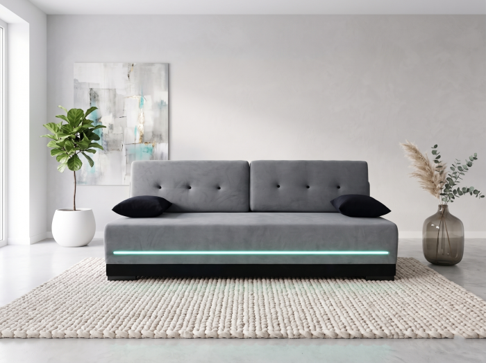 Kanapa z funkcją spania, dodatkowo pasek LED. Kanapa bez boczków. Tkanina gładka, odcień szary. Showroom