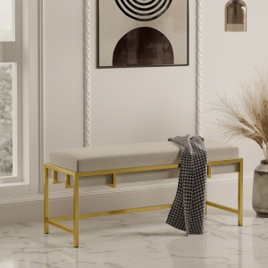 Ławka tapicerowana do przedpokoju, stelaż złoty, tkanina gładka beż. Showroom