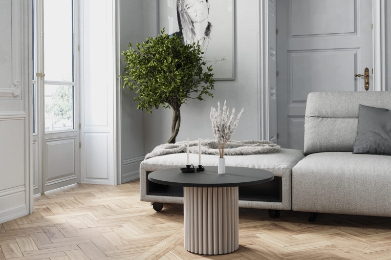 Stolik kawowy okrągły, podstawa Kaszmir okrągła ryflowana, blat czarny. Showroom